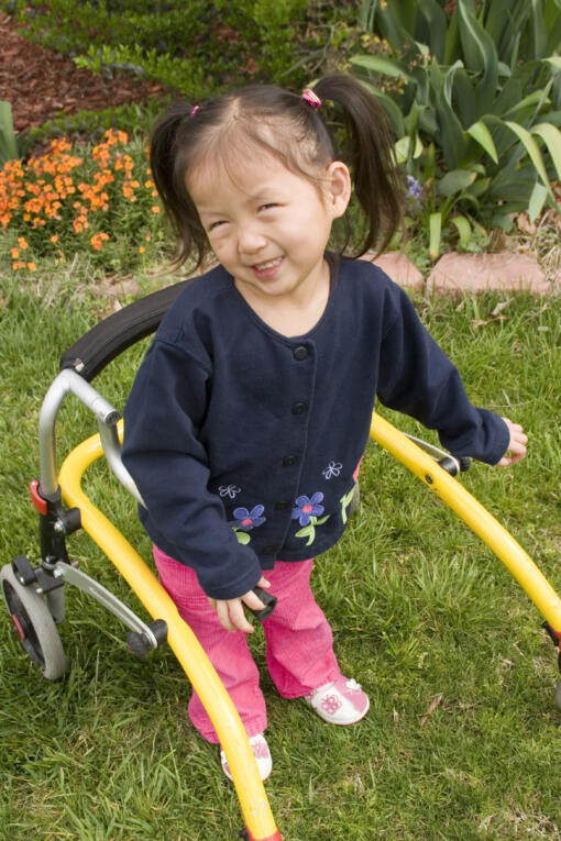 Girl using walking frame