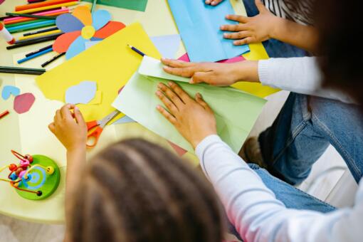 Children's hands making craft