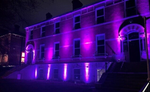 NDA Building lit up purple to mark International Day of Persons with Disabilities