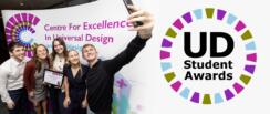 UDSA Banner Image- a group of award winners take a selfie with their award. The UDSA logo is to the right
